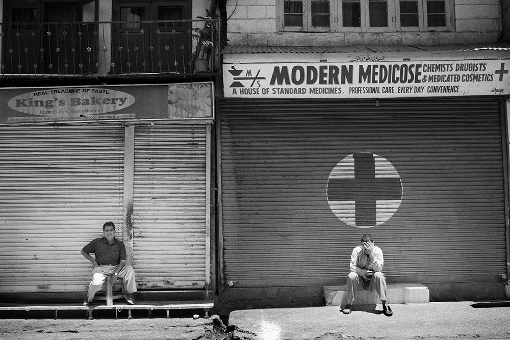 Closed shops during a strike called against the violence of Indian police.